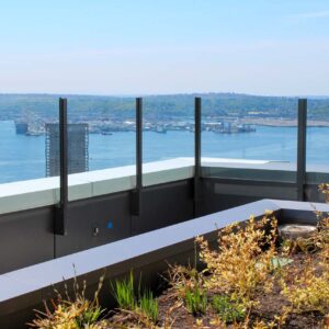 Glass railing on Spire Seattle's rooftop patio
