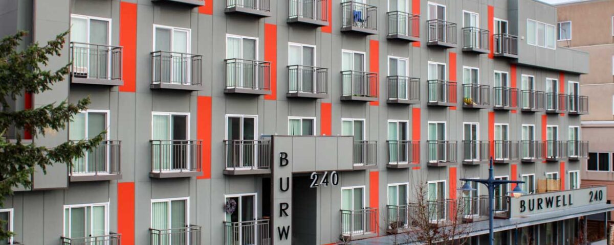 Custom Juliet balconies and tube frames at Harborside Flats in Bremerton, WA