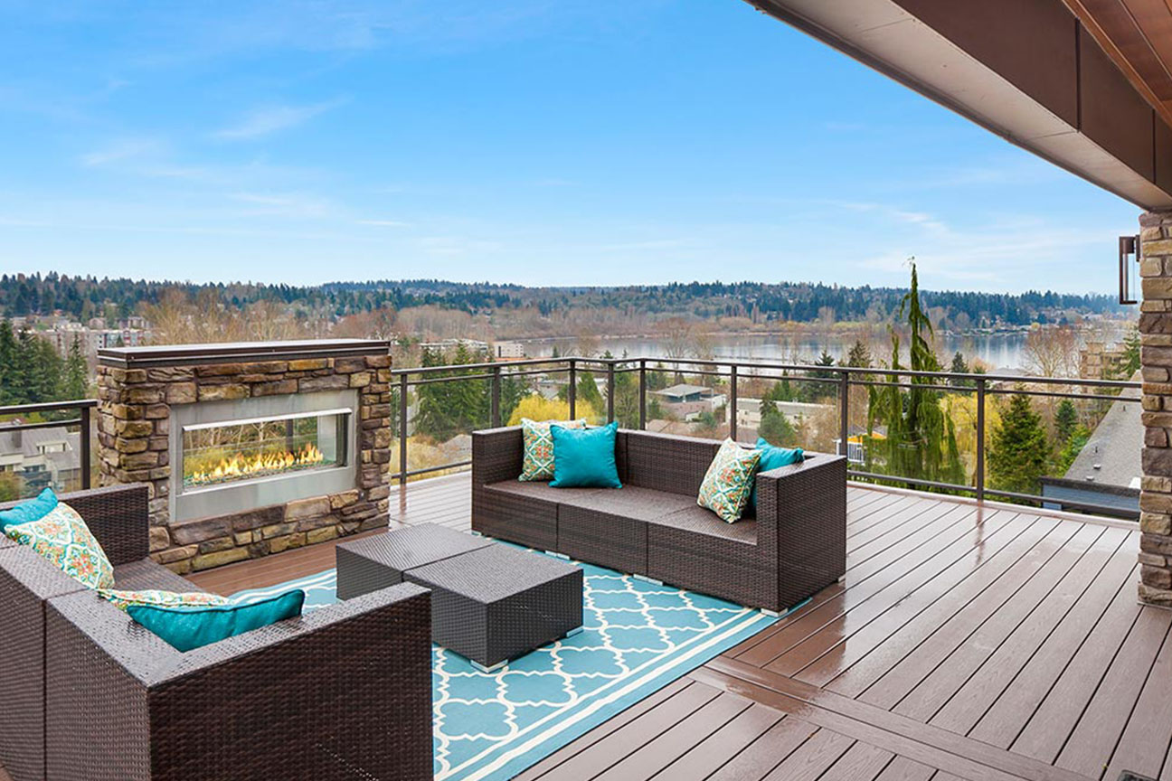 Framed glass railing with double-top on a home's deck