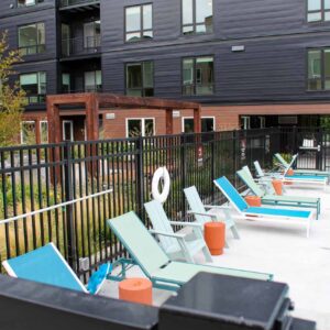 Vertical picket railing fence around pool