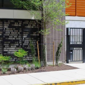 Custom metal enclosure finishes and vertical picket railing gate