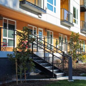 Custom glass railings with balconies and single-top cable railings for stair guardrails