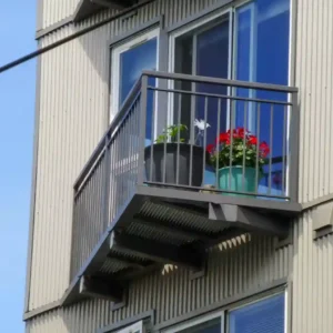 Vertical picket railing on an angled balcony