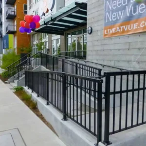 Vertical railing on a multifamily complex's accessible entrance